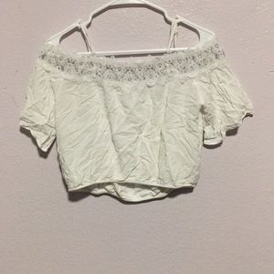 Whit blouse off the the shoulder